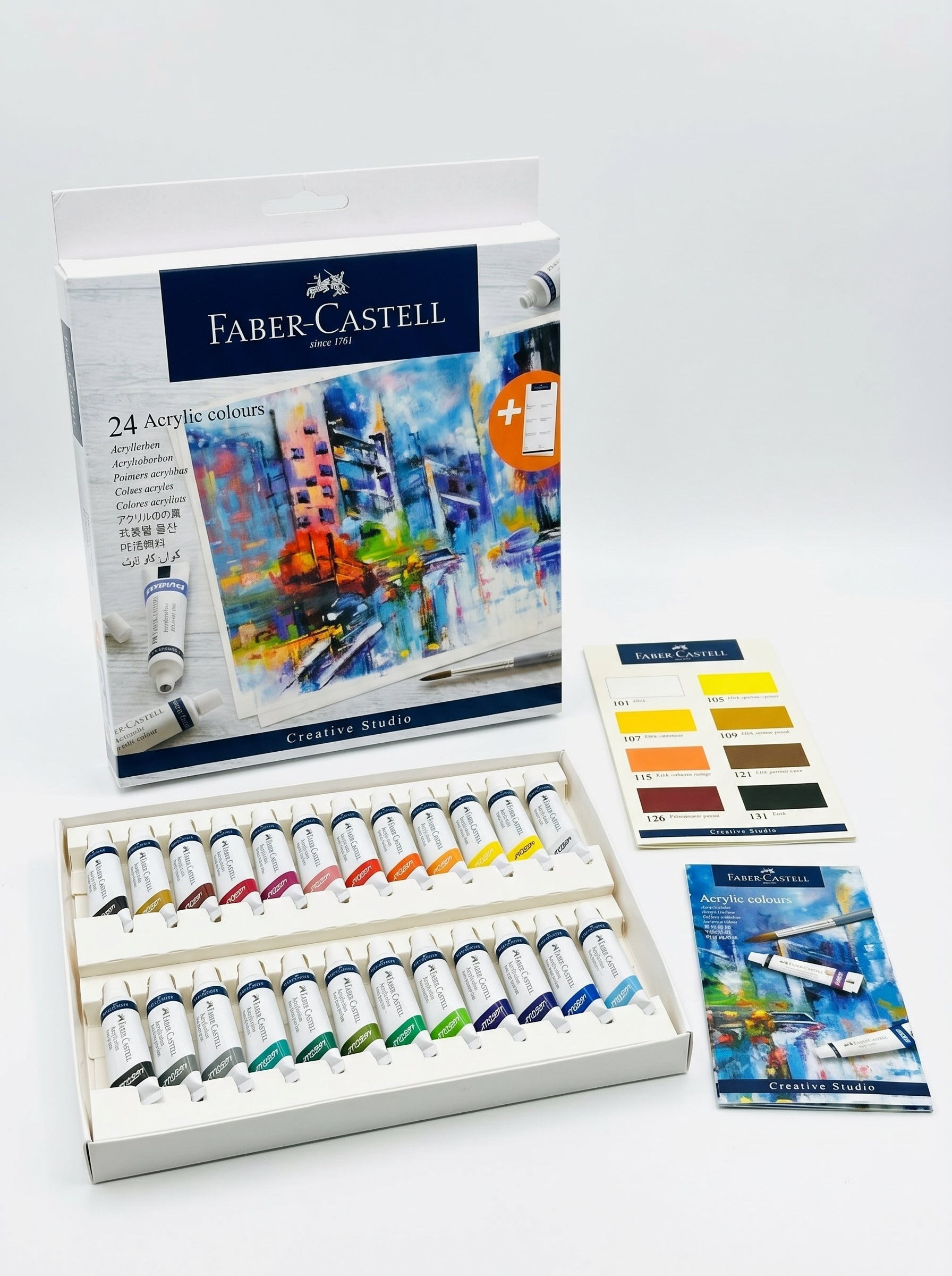 Coffret complet de couleurs acryliques Faber-Castell 24 pcs sur un chevalet de peinture.