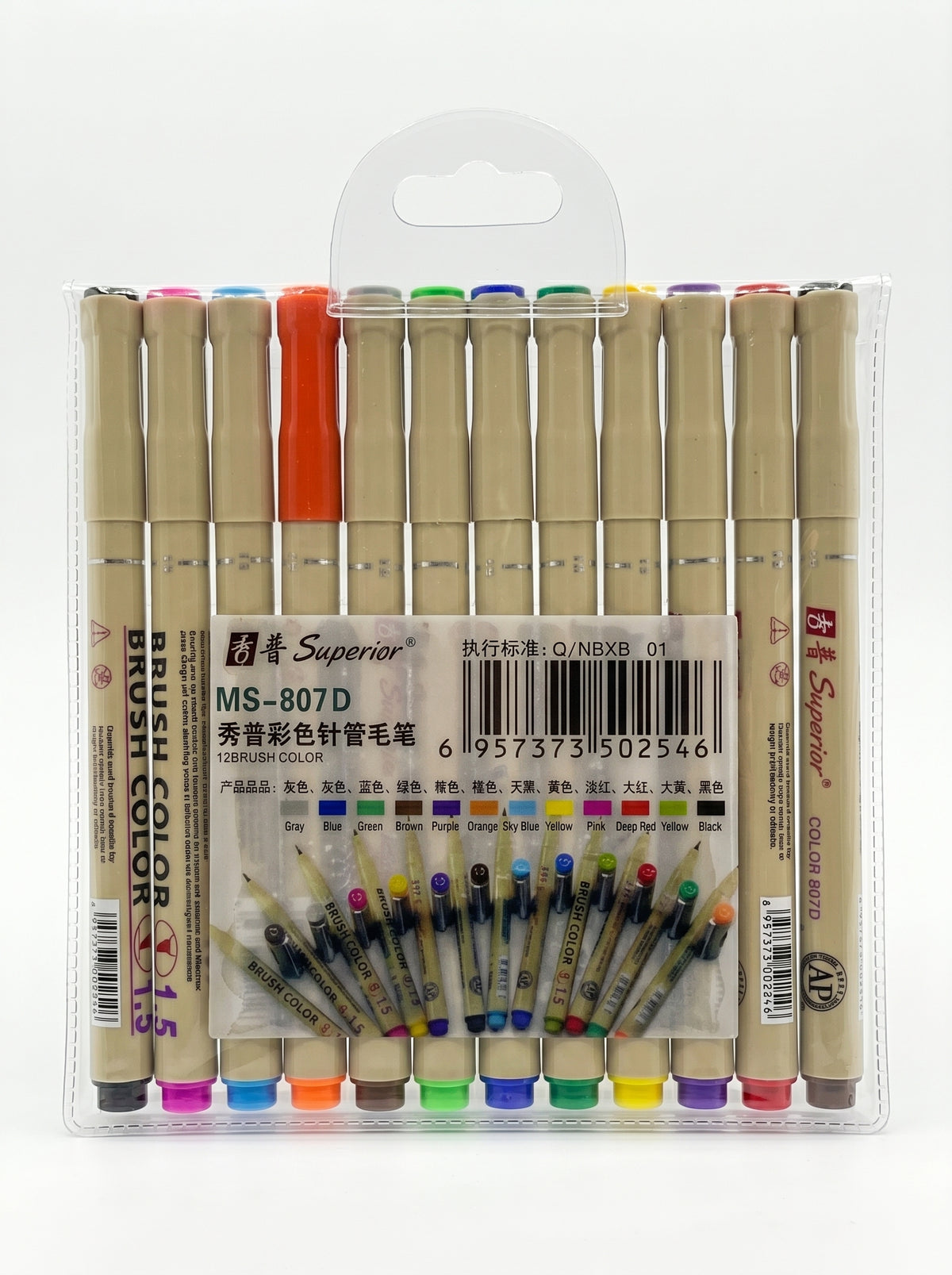 Un artiste utilisant le stylo brush 12 couleurs Superior sur un bureau pour du lettrage créatif.