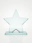 Trophée étoile en verre transparent sur socle pour une remise de trophée d'entreprise.