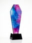 Trophée en verre au design galaxie sur socle noir, idéal pour une récompense cristal.